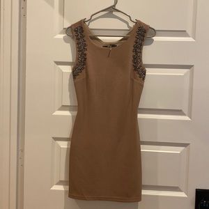 Nude dress with beading detail and back cutout size small